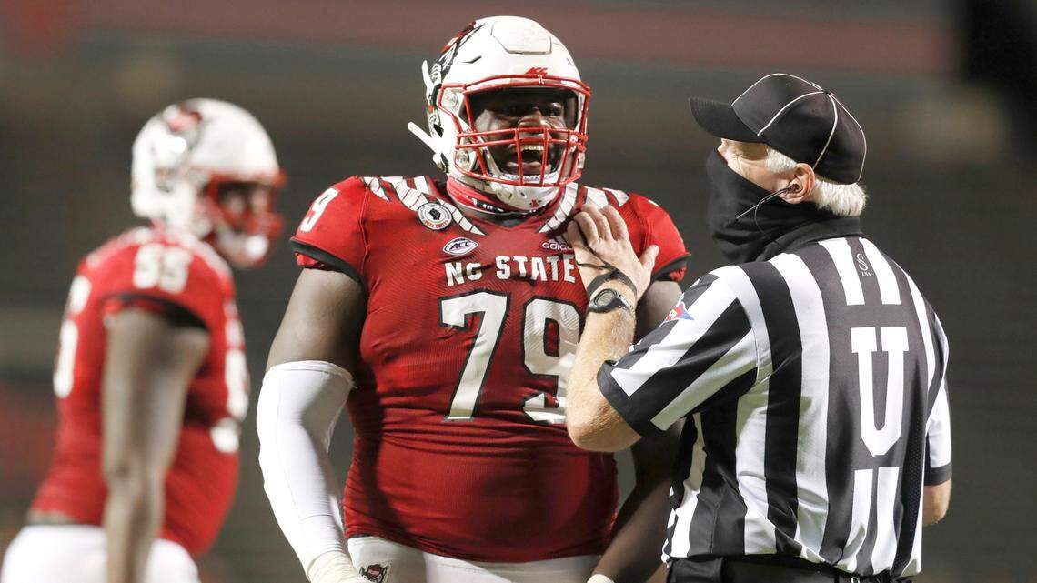 N.C. State offensive tackle Ikem Ekwonu (79) laughs at an opposing lineman during the second half of N.C. State’s 45-42 victory over Wake Forest at Carter-Finley Stadium in Raleigh, N.C, Saturday, Sept. 19, 2020.