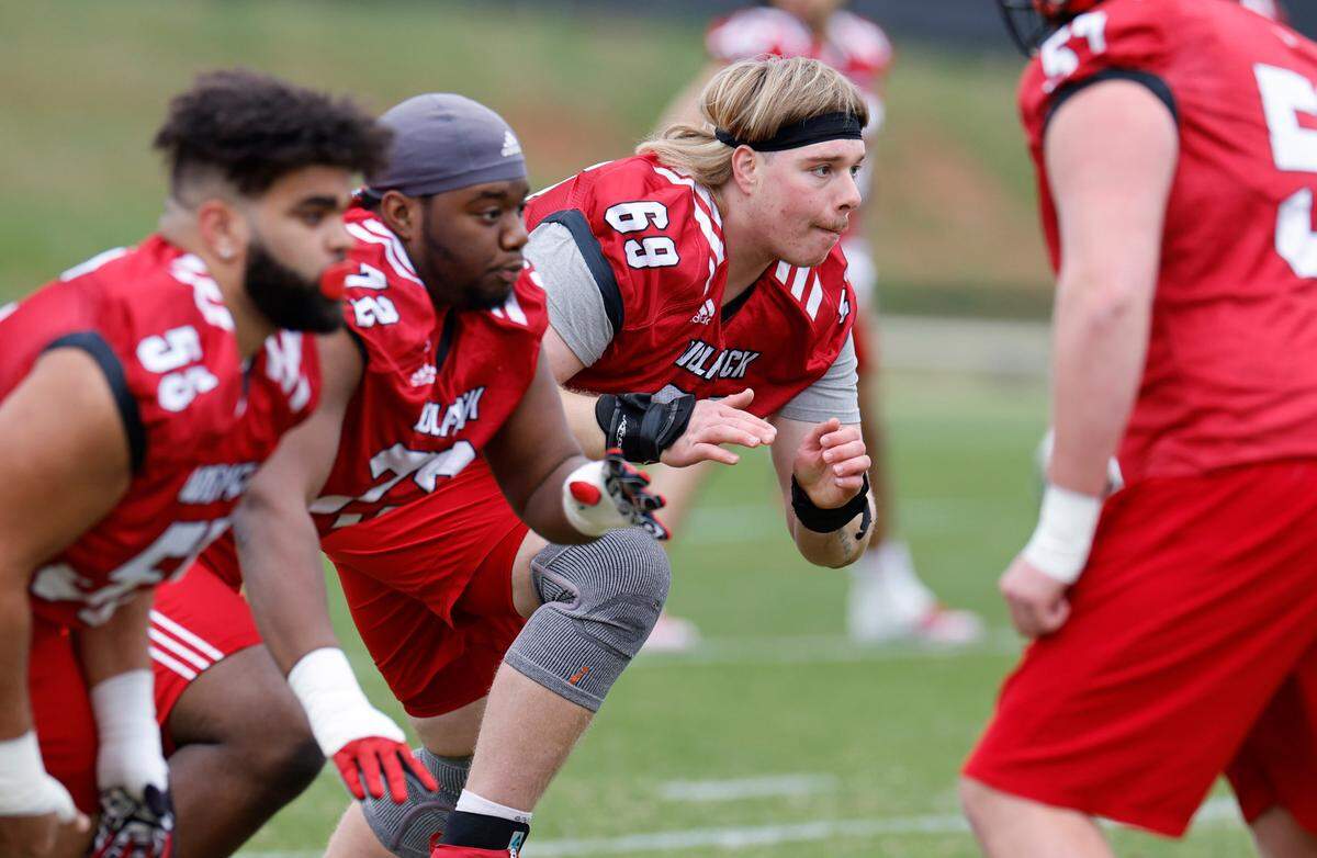 N.C. State offensive lineman Dawson Jaramillo (69) runs a drill during the Wolfpack’s first spring practice in Raleigh, N.C., Wednesday, March 1, 2023.