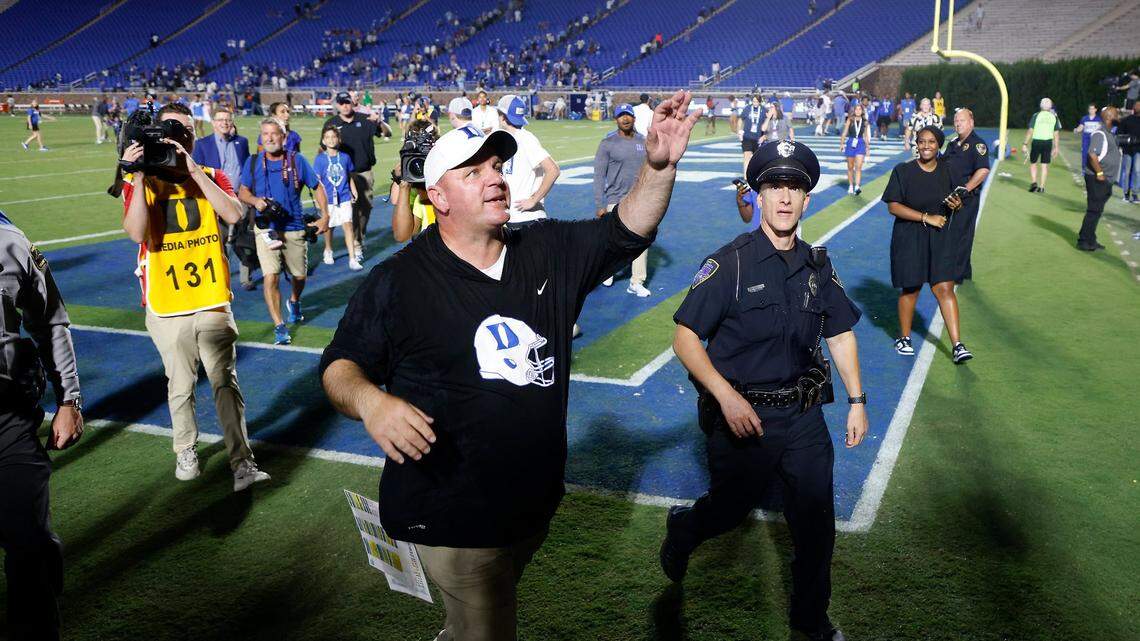 Duke head coach Mike Elko acknowledges the crowd following the Blue Devils 30-0 victory over Temple at Wallace Wade Stadium on Friday, Sept. 2, 2022, in Durham, N.C.