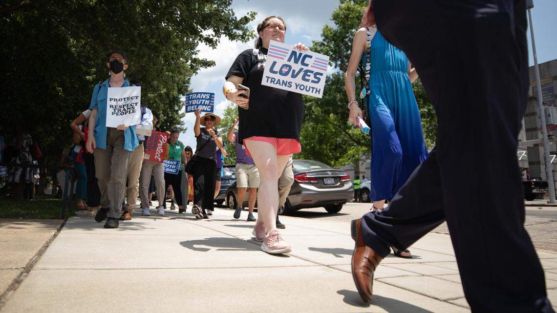 Advocates for LGBTQ+ equality march around the North Carolina General Assembly on Tuesday, June 27, 2023 to rally in opposition to anti-LGBTQ+ bills moving through the General Assembly. The legislative package includes HB808, a bill which would prohibit access to gender-affirming care for transgender youth in North Carolina as of August 1.