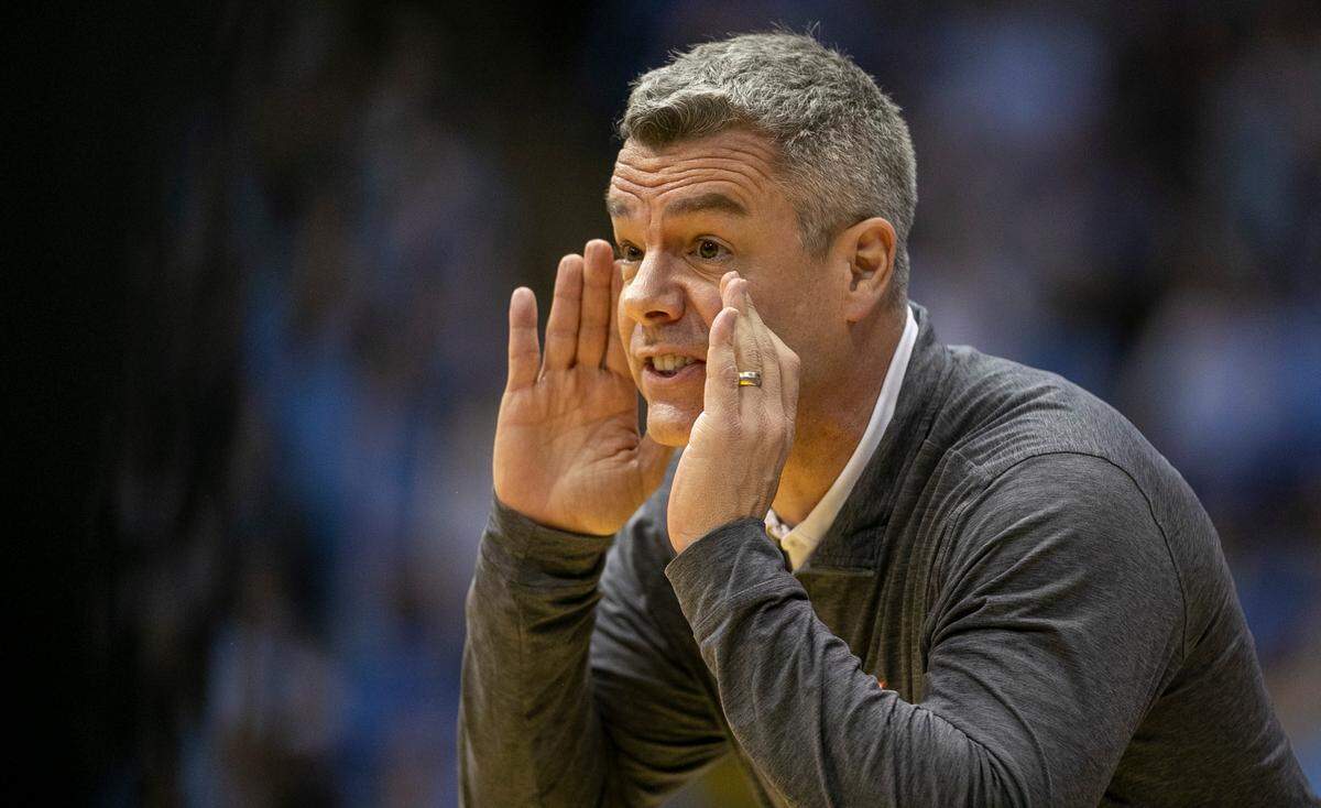 Virginia coach Tony Bennett directs his team during the first half against North Carolina on Saturday, February 25, 2023 at the Smith Center in Chapel Hill, N.C.