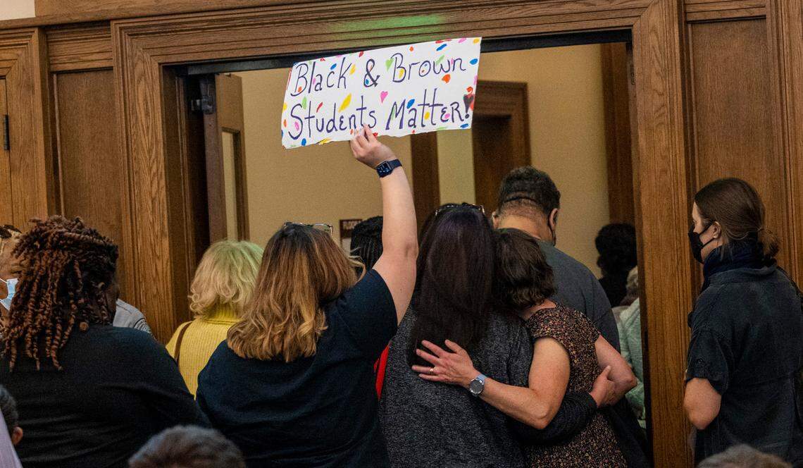 Parents, students, and community members leave a Chatham County school board meeting following a public comment session after reports of a “slave auction” of Black students led by classmates at J.S. Waters School in Goldston sparked outrage in the community.
