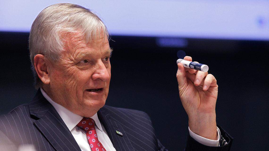State Treasurer Dale Folwell holds up a weight loss drug during a meeting of the NC State Health Plan’s board of trustees on Thursday, Jan. 25, 2024, in Raleigh, N.C. The board voted to end all plan coverage of weight loss drugs beginning April 1.