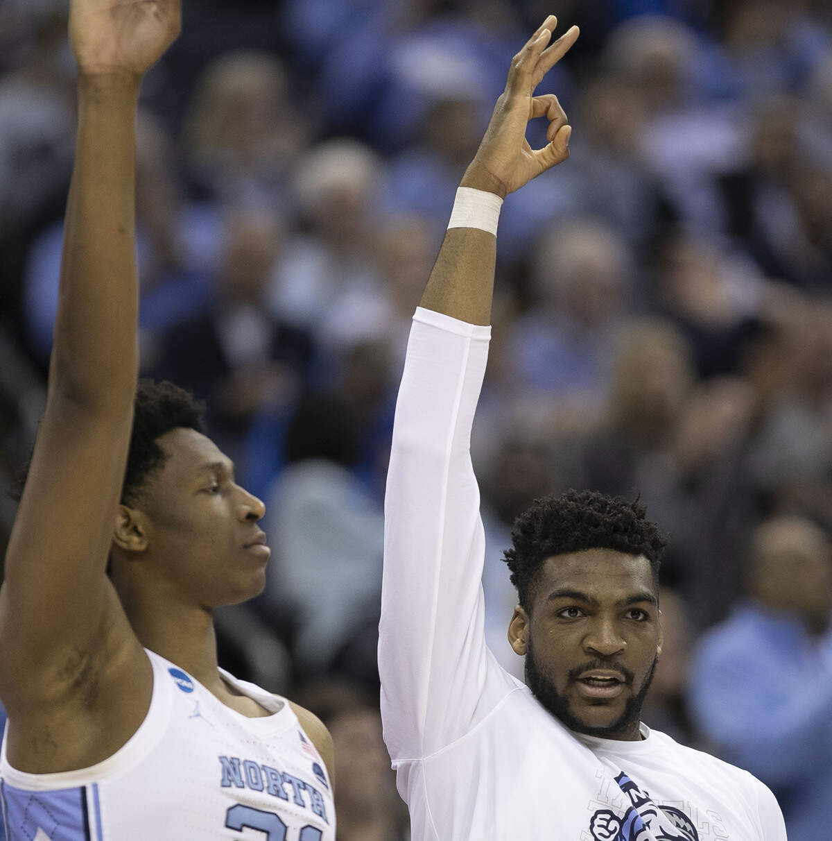 North Carolina’s Brandon Huffman (42) reacts after a three-point basket by Cameron Johnson in the second half during the second round of the NCAA Tournament on Sunday, March 24, 2019 at Nationwide Arena in Columbus, Ohio.