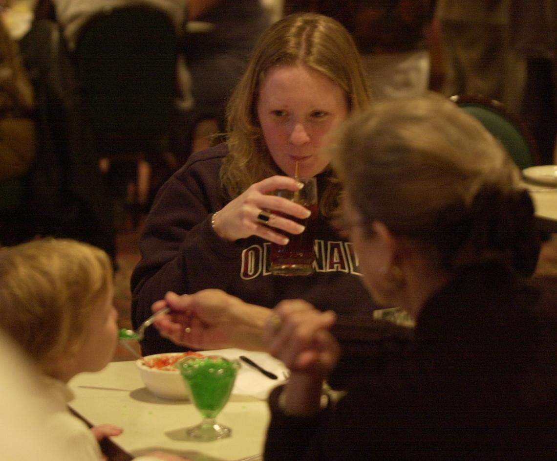 Mother, daughter and granddaughter enjoy a meal at a Fayetteville K&W in this undated photo.