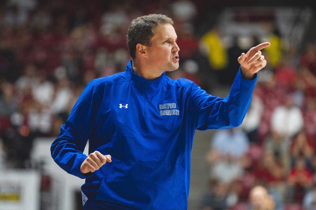 McNeese State Cowboys head coach Will Wade gives instructions to his players from the bench during their game against Alabama in Nov. 2024.