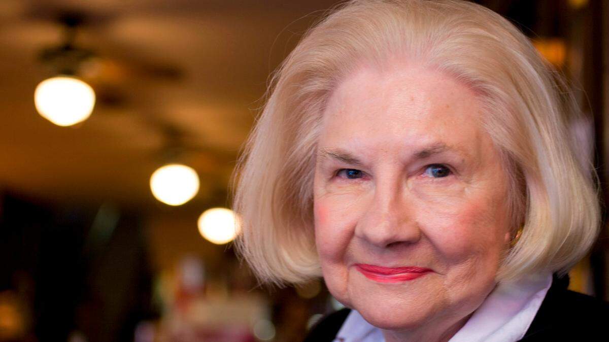 Floye Dombalis photographed at the cash register the family owned Mecca Restaurant on Martin Street in downtown Raleigh on Friday October 3, 2008.