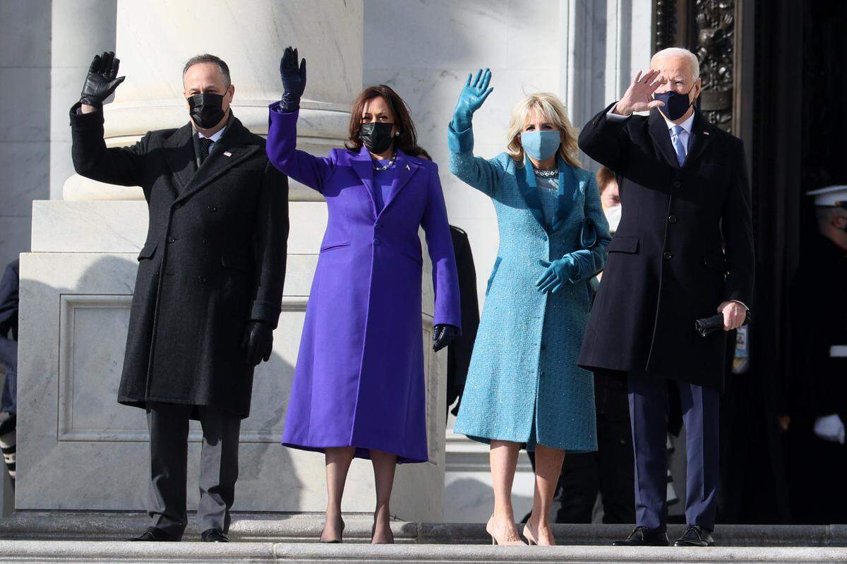 From left, Doug Emhoff, U.S. Vice President-elect Kamala Harris, Jill Biden and President-elect Joe Biden wave as they arrive on the East Front of the U.S. Capitol for the inauguration on Jan. 20, 2021 in Washington, DC. During today’s inauguration ceremony Joe Biden becomes the 46th president of the United States.