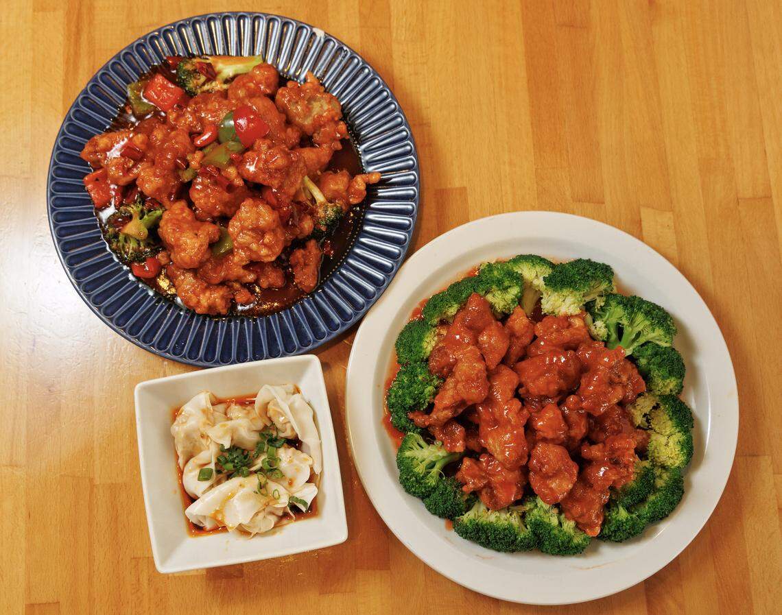 General Tso’s Chicken, Szechuan Chili Wontons and Sesame Chicken are pictured at Chuan Cafe on Thursday, March 5, 2026, in Raleigh, N.C.