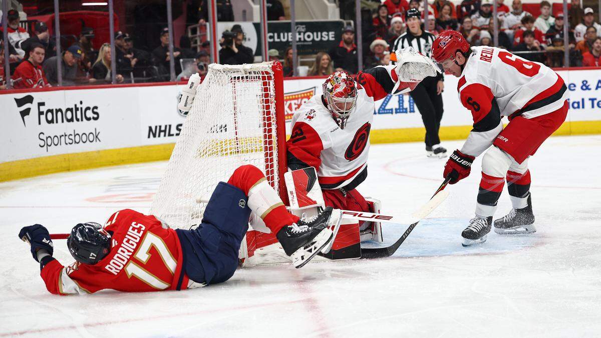 Goalie Frederik Andersen of the Carolina Hurricanes makes a save against Evan Rodrigues (17) of the Florida Panthers during the first period at Lenovo Center on Dec. 23, 2025 in Raleigh, North Carolina.