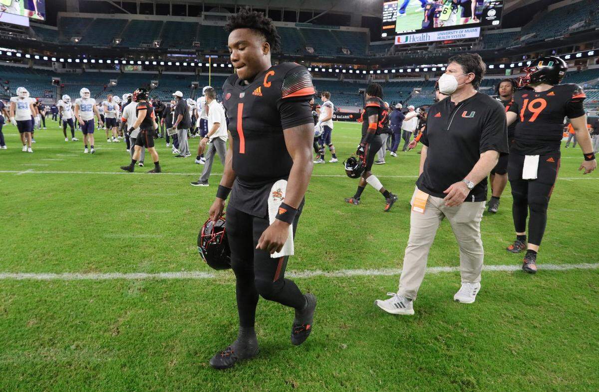 Miami Hurricanes quarterback D’Eriq King (1) walks off the field after UM loses to UNC at Hard Rock Stadium in Miami Gardens on Saturday, December 12, 2020.