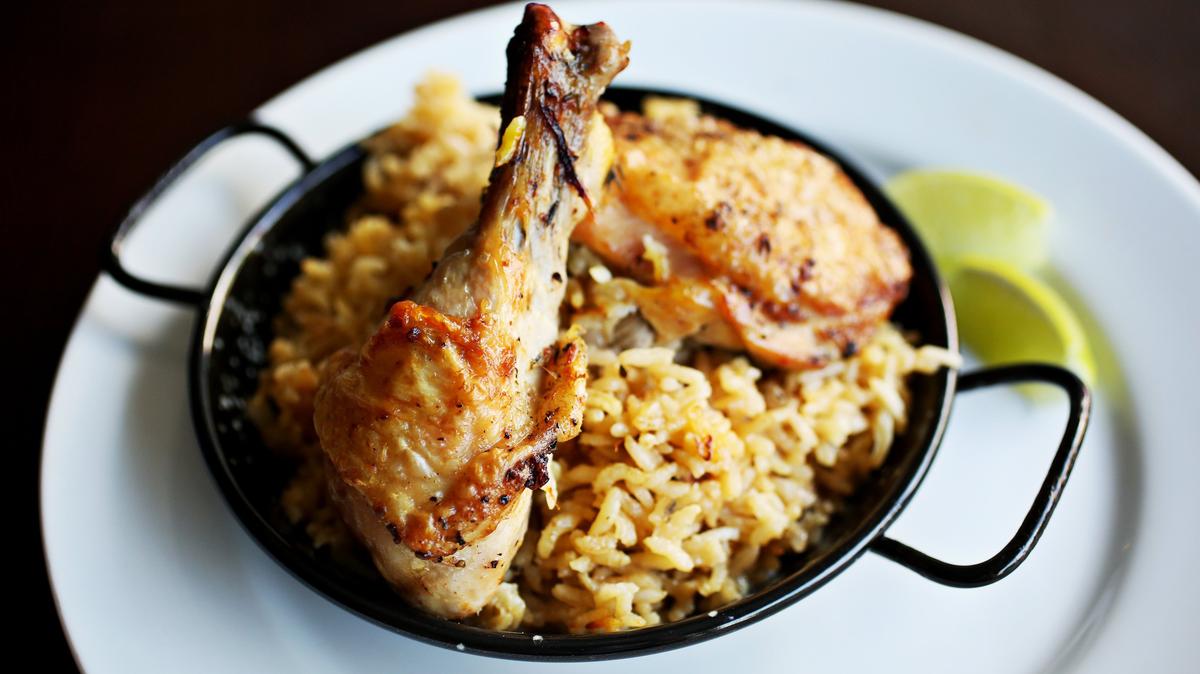 Chef Roberto Copa Matos of COPA calls on his Spanish heritage for his distinctive presentation of the Cuban classic, arroz con pollo. COPA will close in August after six years in Durham.