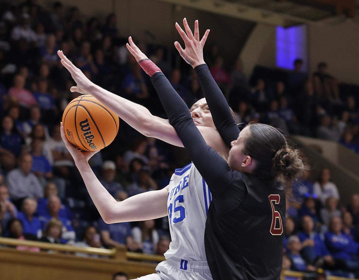 Duke’s Toby Fournier drives to the basket against College of Charleston’s Sophia Tougas during the first half of the Blue Devils’ first-round NCAA Tournament game on Friday, March 20, 2026, at Cameron Indoor Stadium in Durham, N.C.