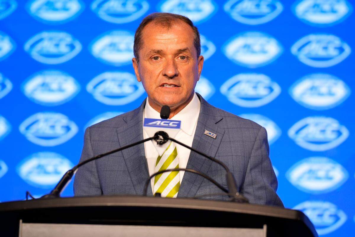 ACC Commissioner Jim Phillips speaks to the media during ACC Kickoff at Hilton Charlotte Uptown.