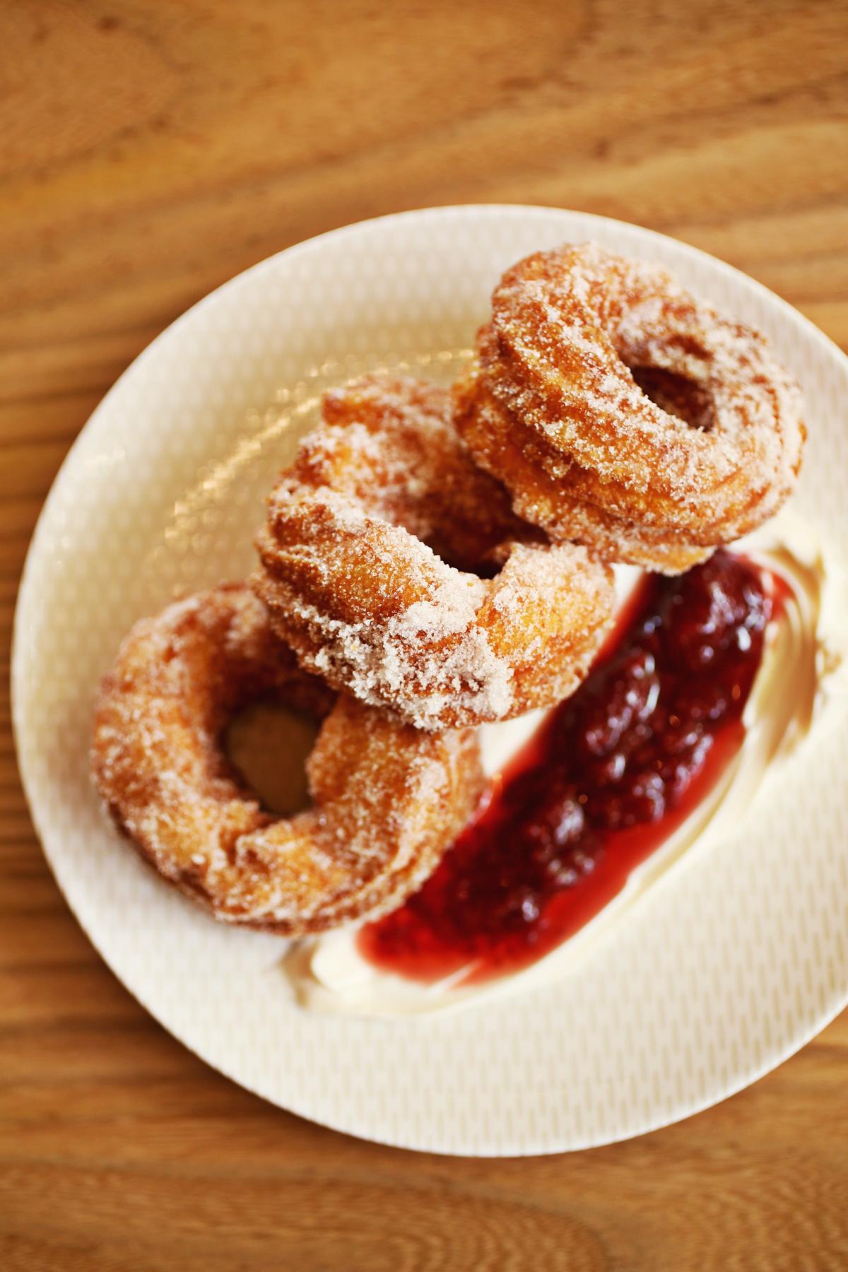The crullers - fried to order, rolled in cinnamon sugar, and served with chantilly mascarpone and house-made jam - are the way to go at Jack Tar and the Colonel’s Daughter in Durham.