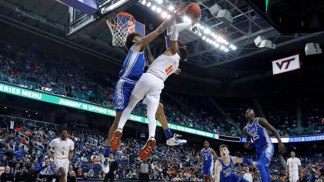 Duke’s Dereck Lively II (1) blocks the shot by Miami’s Jordan Miller (11) during Duke’s 85-78 victory over Miami in the semifinals of the ACC Men’s Basketball Tournament in Greensboro, N.C., Friday, March 10, 2023.