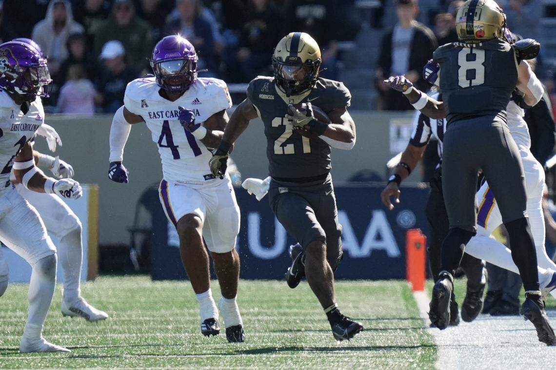 Army Black Knights running back Tyrell Robinson (21) carries during the second half against the East Carolina Pirates at Michie Stadium.