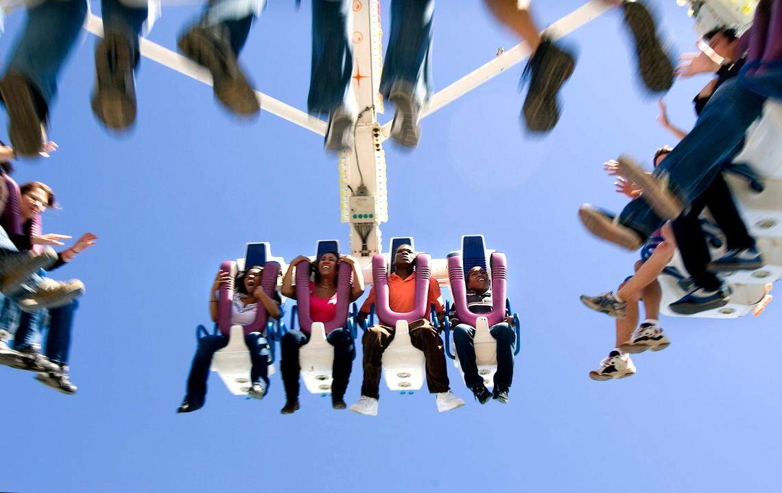 Thrill-seekers head straight to the rides at the N.C. State Fair.