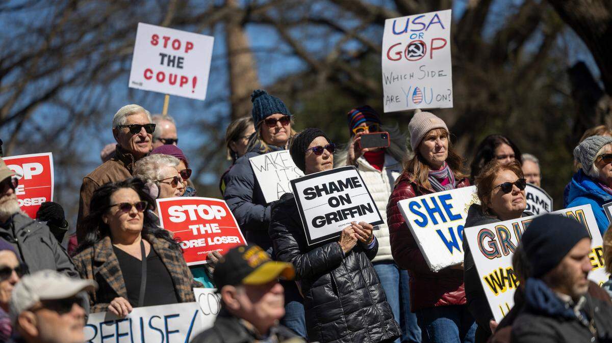 Hundreds of demonstrators rally at the North Carolina State Capitol on Monday, Feb. 17, 2025. The rally, organized by Common Cause, protested Republican state Supreme Court candidate Jefferson Griffin’s challenge of 65,000 ballots in November’s election. He trails Democratic incumbent Allison Riggs.