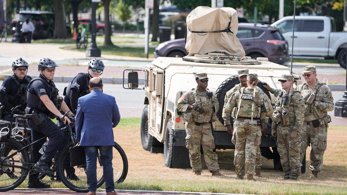 DC National Guard members and U.S. Capitol Police are pictured at Union Station in Washington, D.C., on Aug. 14, 2025.
