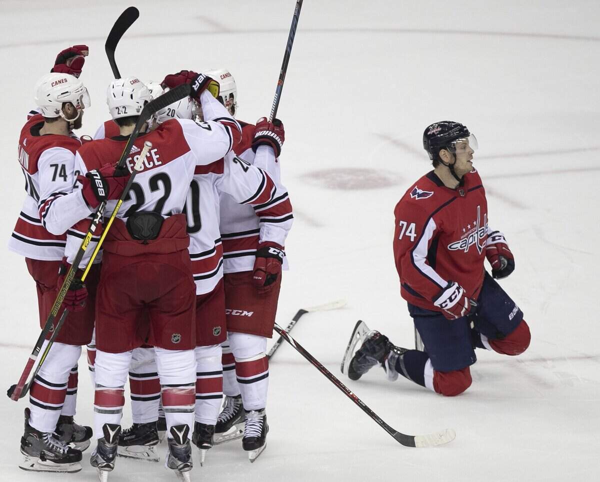 Carolina Hurricanes’ Jaccob Slavin (74), Brett Pesce (22) and Sebastian Aho (20) and celebrate with Teuvo Teravainen (86) after his goal in the second period during Game 7 of their first round Stanley Cup series on Wednesday, April 24, 2019 at Capital One Arena in Washington, D.C.