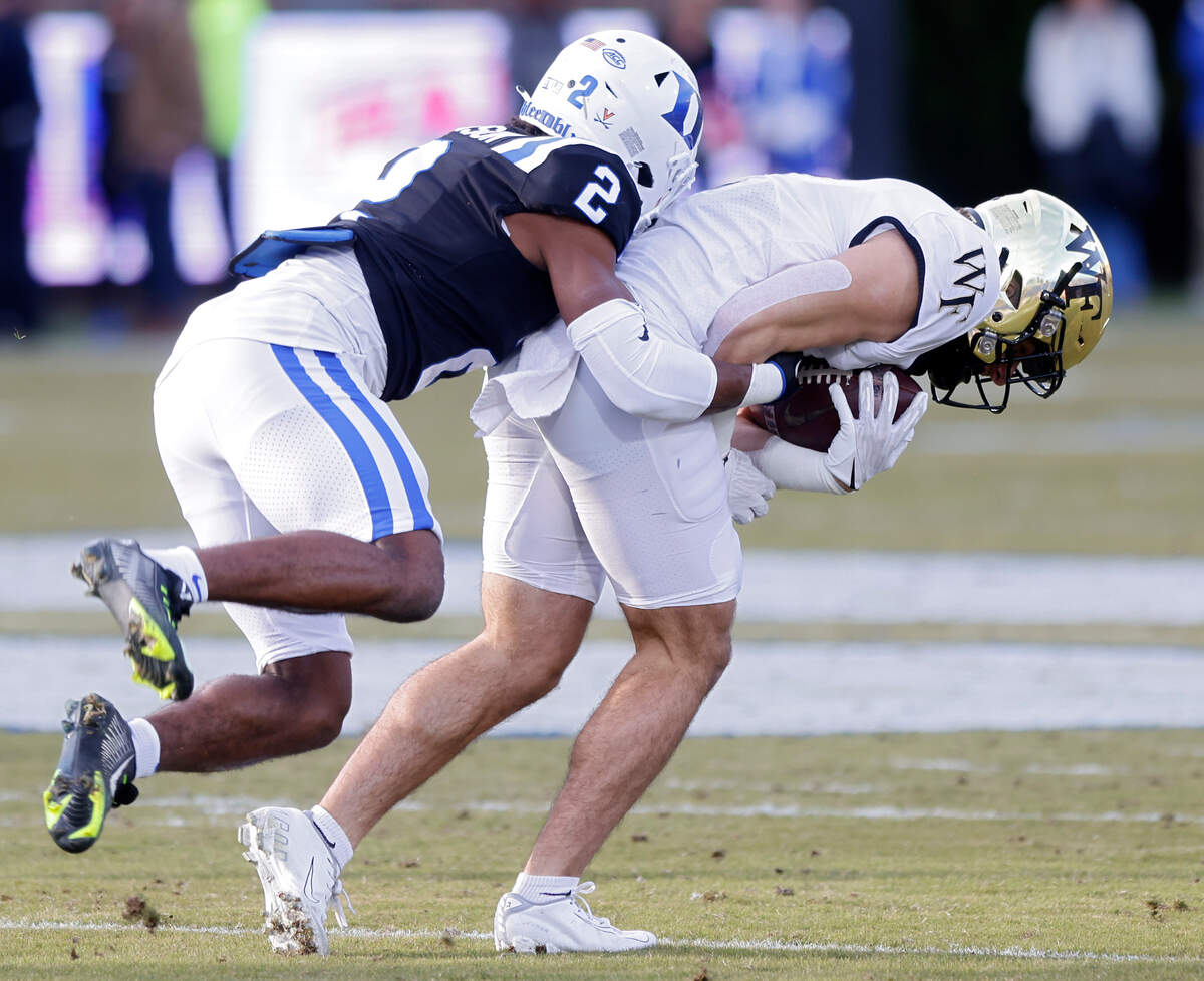 Duke’s Jaylen Stinson tackles Wake Forest’s Taylor Morin during the first half of the Blue Devils’ final regular season game at Wallace Wade Stadium on Saturday, Nov. 26, 2022, in Durham, N.C.