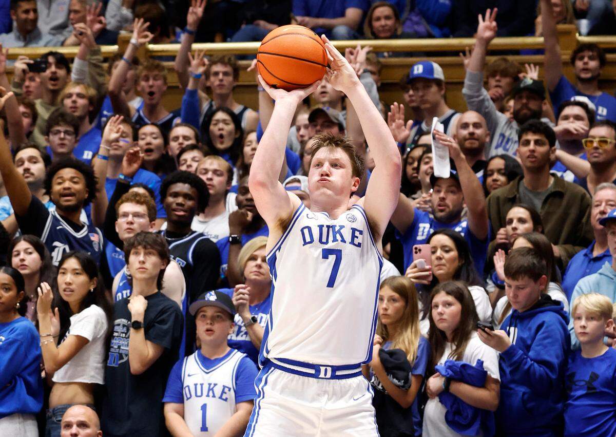 Duke’s Kon Knueppel (7) shoots a three-pointer during the first half of Duke’s game against Maine at Cameron Indoor Stadium in Durham, N.C., Monday, Nov. 4, 2024.