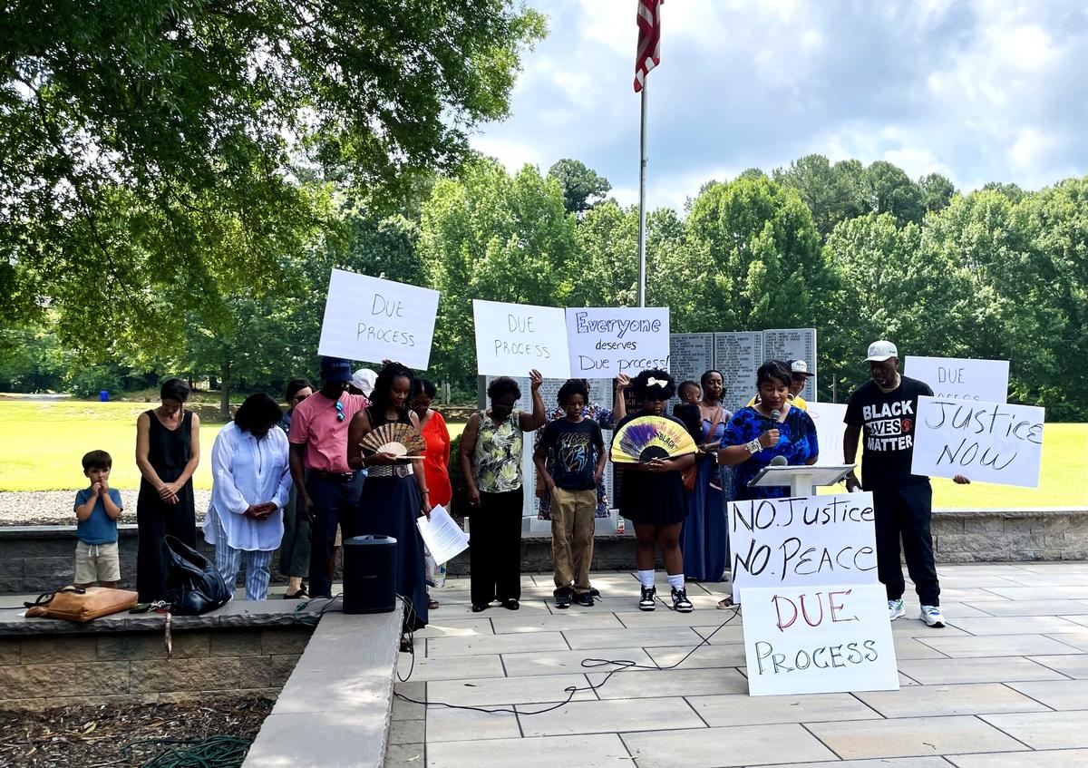 Members and supporters of the Chapel Hill-Carrboro NAACP protested the Chapel Hill-Carrboro City Schools treatment of Carrboro High School Principal Helena Thomas on Wednesday, June 11, 2025. They are asking to end her leave and give her due process.