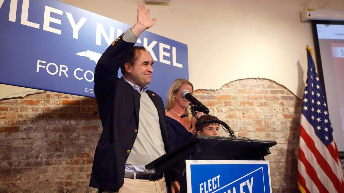 Wiley Nickel acknowledges the crowd as he prepares to speak at his campaign party at Sitti in Raleigh, N.C., Tuesday, Nov. 8, 2022.