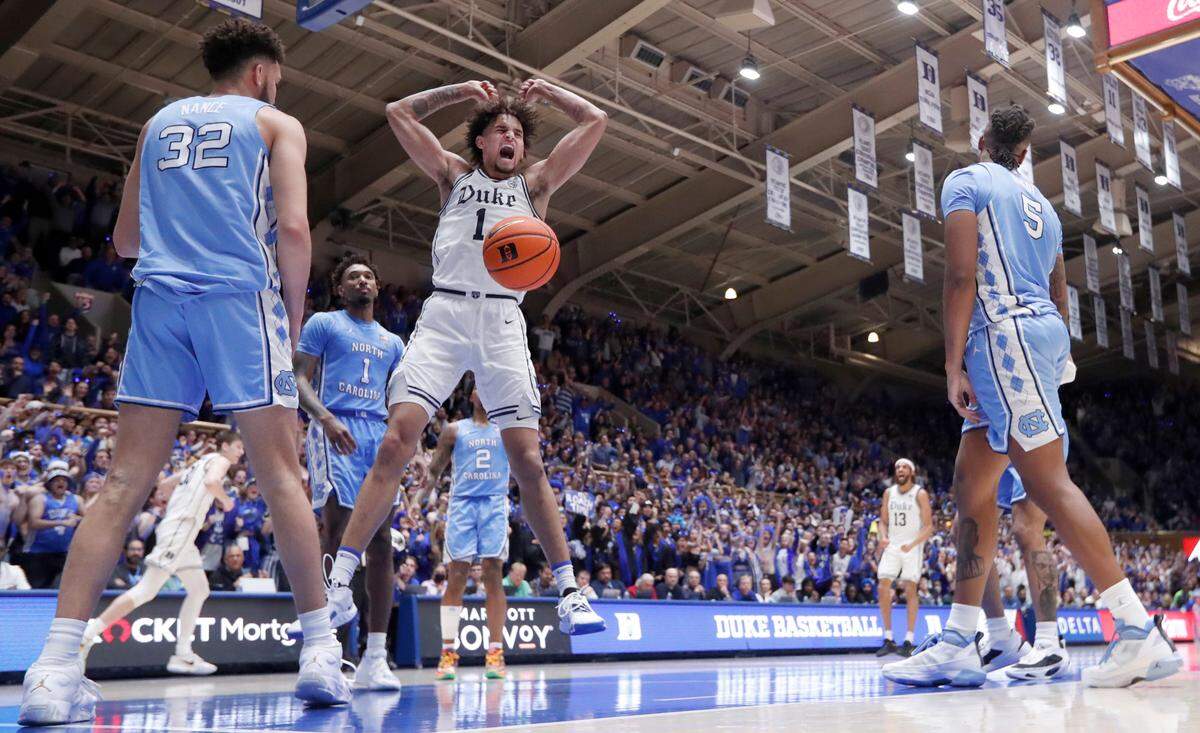 Duke’s Dereck Lively II (1) celebrates after slamming in two with 1:37 left in the game to put Duke up 59-57 during Duke’s 63-57 victory over UNC at Cameron Indoor Stadium in Durham, N.C., Saturday, Feb. 4, 2023.