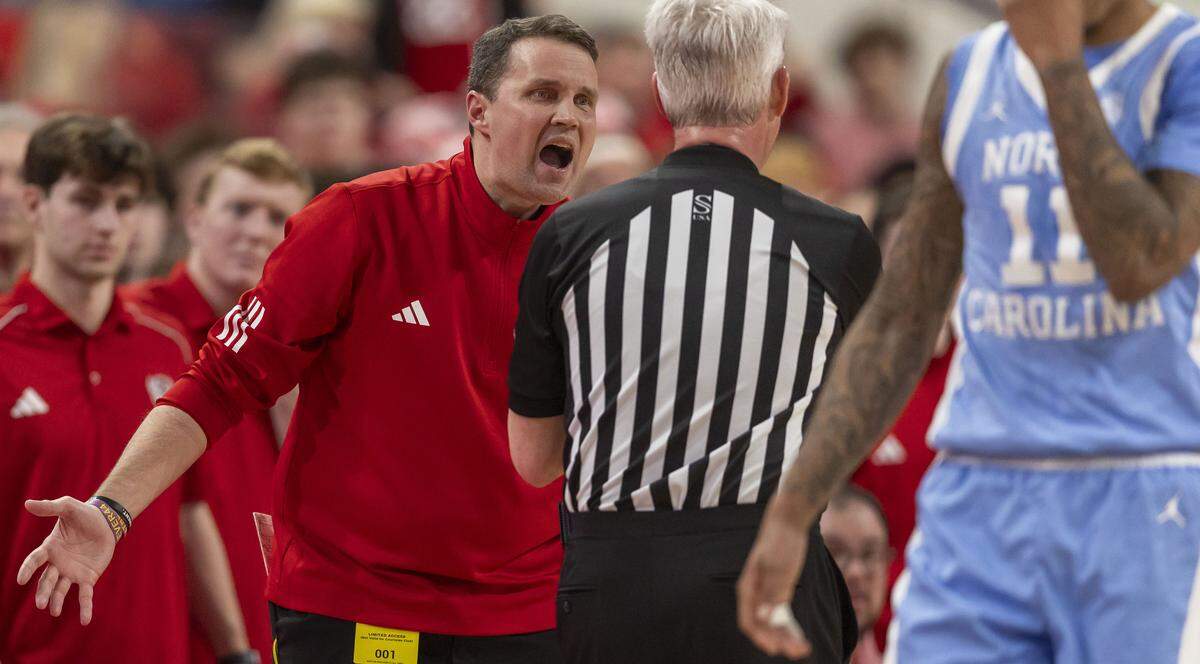 N.C. State head coach Will Wade argues with official Brian O’Connell in the first half against North Carolina on Tuesday, February 17, 2026 at Lenovo Center in Raleigh, N.C. 