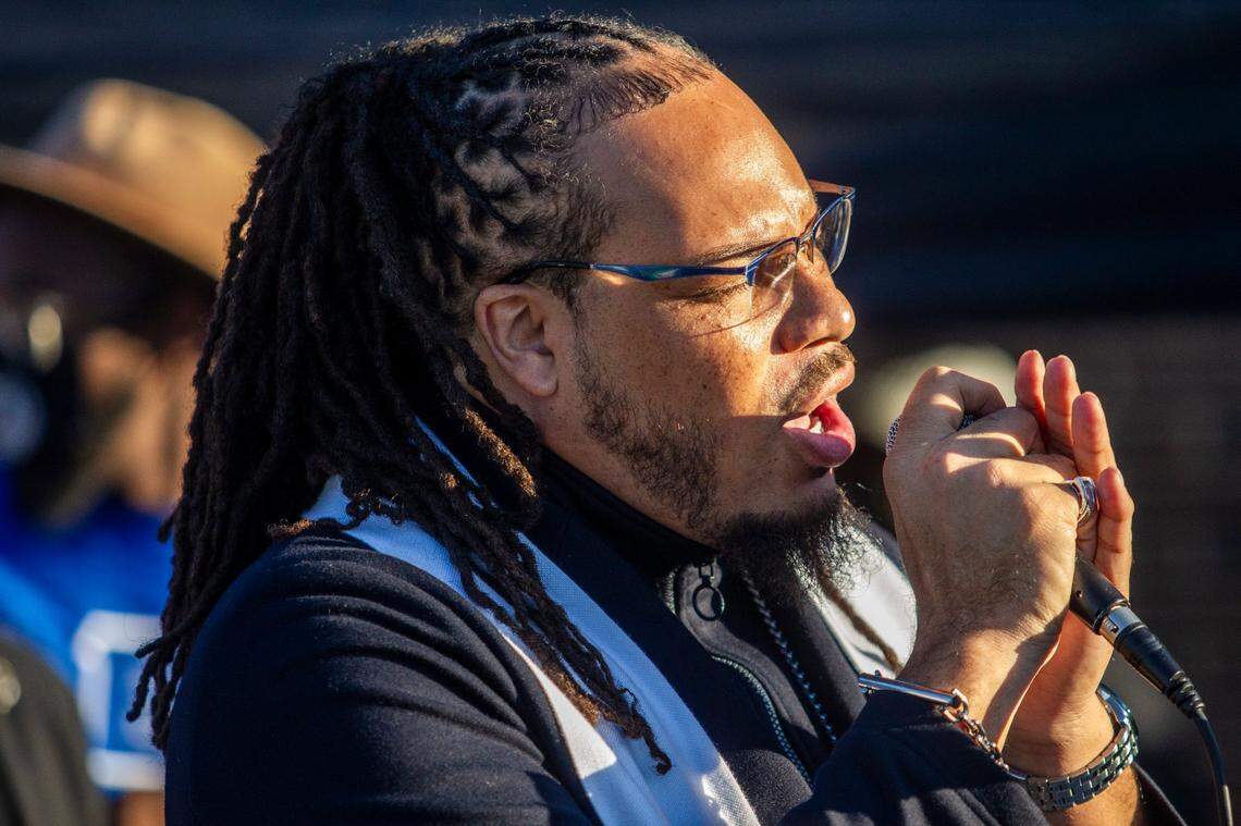 Rev. Greg Drumwright speaks before a group of about 500 demonstrators protesting systemic racism prior to a march and rally at the Alamance County Courthouse in Graham, NC Tuesday, Nov. 3, 2020.