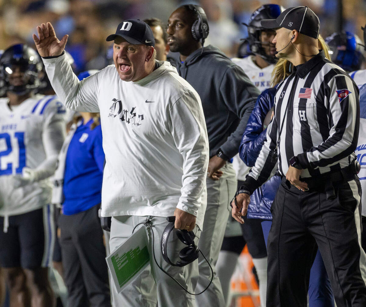 Duke coach Mike Elko argues with official Todd Riddick in the fourth quarter against North Carolina on Saturday, Nov. 11, 2023 at Kenan Stadium in Chapel Hill, N.C.