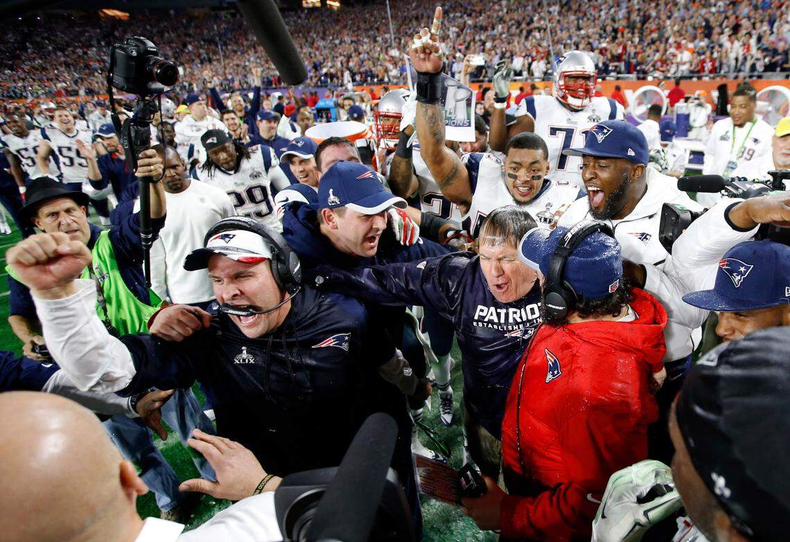 New England Patriots head coach Bill Belichick reacts after being dunked with Gatorade after defeating the Seattle Seahawks in Super Bowl XLIX at University of Phoenix Stadium in Feb. 2015.