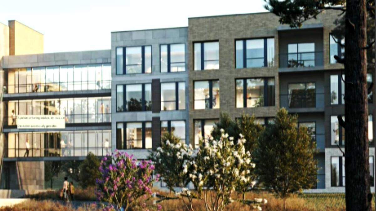 A concept plan for The Reserve at Blue Hill includes a pedestrian bridge between two wings. A driveway to the parking lot in the rear of the project would connect drivers with Ephesus Church Road in Chapel Hill.