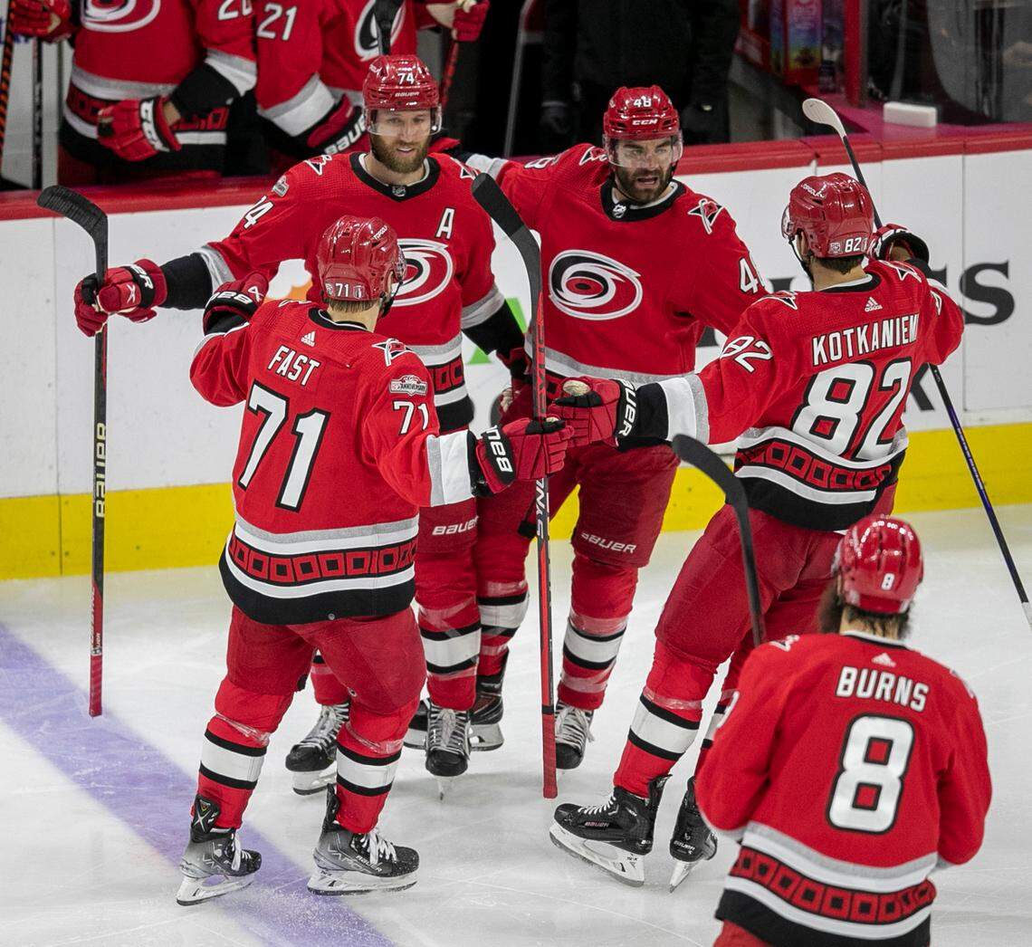 The Carolina Hurricanes Jesperi Kotkaniemi (82) scores in New Jersey Devils goalie Akira Schmid (40) in the second period during Game 5 of their second round Stanley Cup playoff series on Thursday, May 11, 2023 at PNC Arena in Raleigh, N.C.