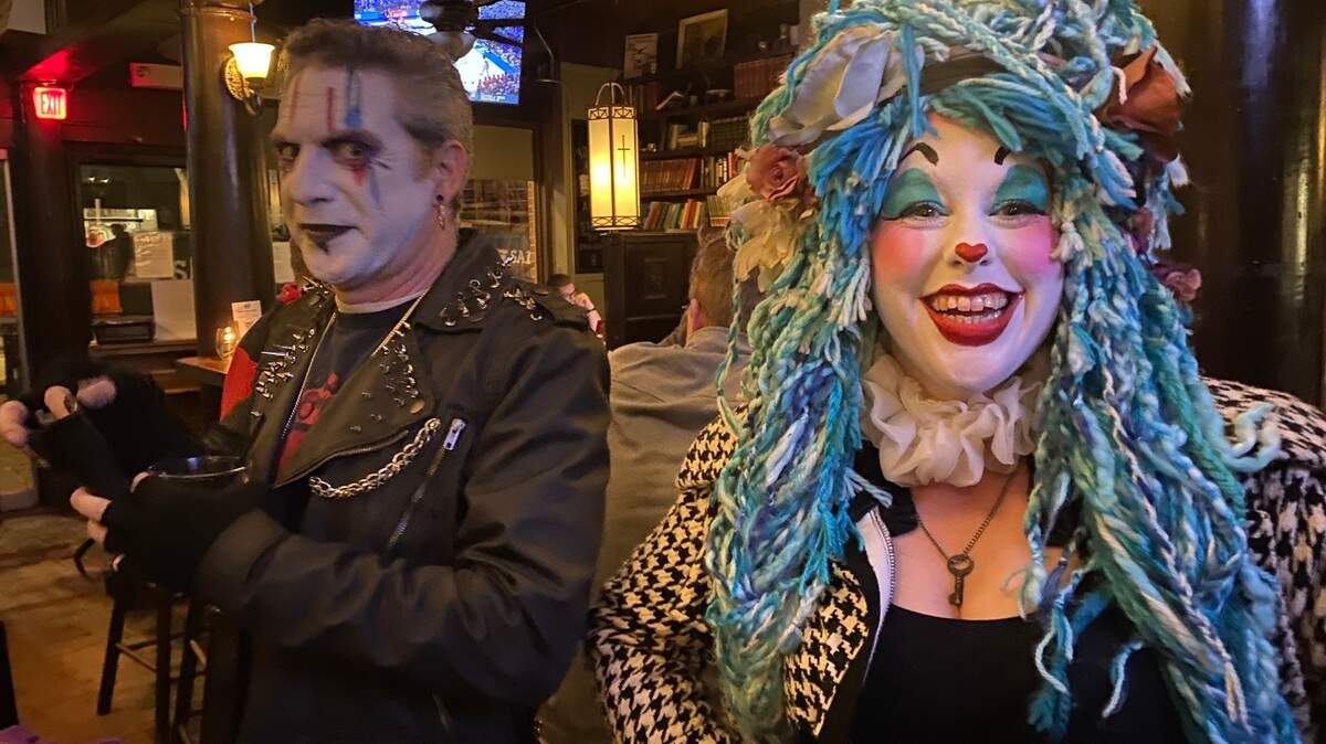 Erik Yowell and Sara Bloo kick off the first Triangle Honks Clown Crawl at Bull McCabe’s in Durham, because “the world is in dire need of your silly honking about.”