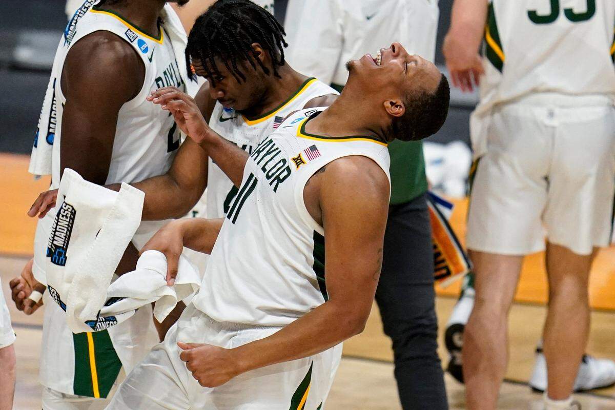 Baylor guard Mark Vital (11) celebrates after a 76-63 win over Wisconsin in a second-round game in the NCAA men’s college basketball tournament at Hinkle Fieldhouse in Indianapolis, Sunday, March 21, 2021. 