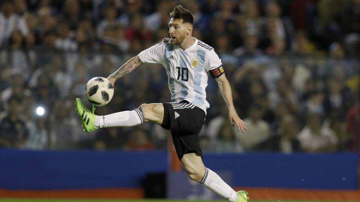Argentina's Lionel Messi controls the ball during a friendly soccer match between Argentina and Haiti at the Bombonera stadium in Buenos Aires, Argentina, on May 29, 2018. Messi and Cristiano Ronaldo have split the last 10 FIFA Player of the Year awards, and this is likely their last chance to win a World Cup.