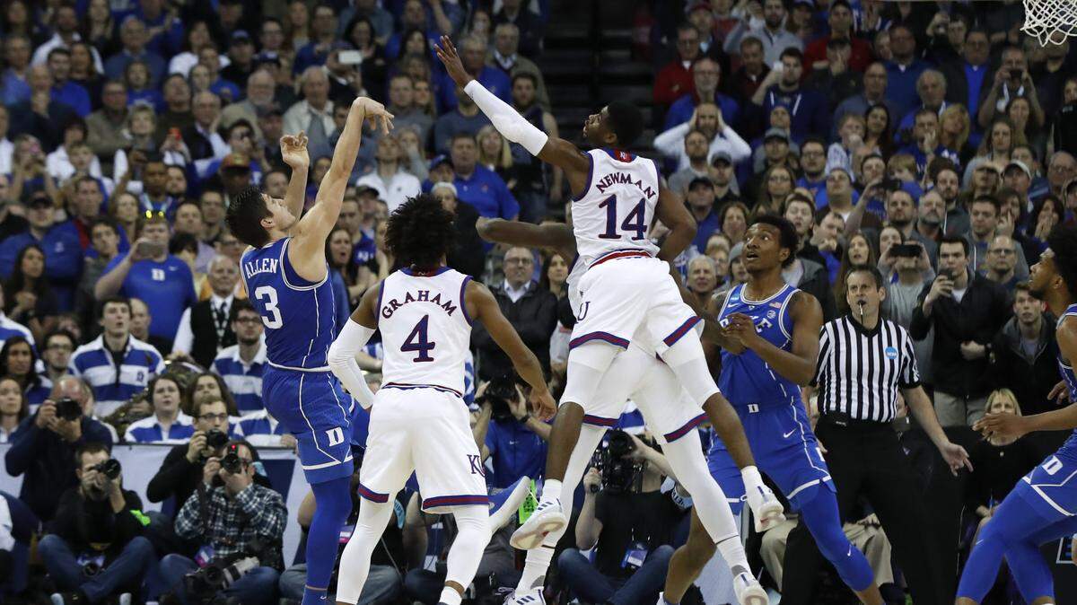 Duke’s Grayson Allen’s last second shot in regulation does not fall during Kansas’ 85-81 victory over Duke in the Midwest Regional Final at CenturyLink Center in Omaha, Neb. Sunday, March 25, 2018.