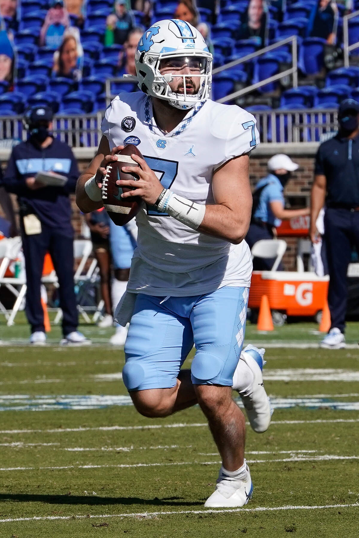 North Carolina Tar Heels quarterback Sam Howell (7) drops back to pass against the Duke Blue Devils during the first quarter at Wallace Wade Stadium. 
