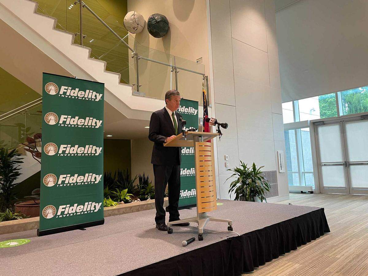 Gov. Roy Cooper talks about an expansion by Fidelity Investments at a press conference May 12, 2021 in Research Triangle Park in Durham, North Carolina.