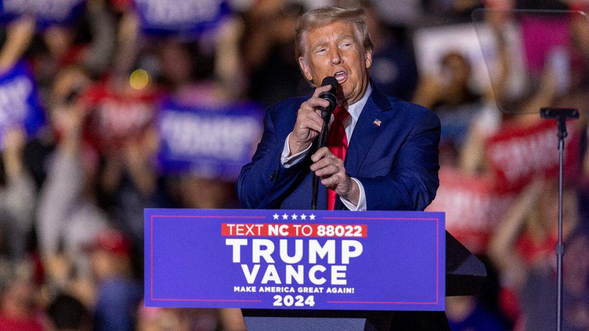 Former President Donald Trump speaks during a rally at Minges Coliseum in Greenville on Monday, Oct. 21, 2024. With two weeks until Election Day, Trump went on a three-city tour, in which Trump will also see the destruction caused by Hurricane Helene in Asheville and speak at a faith conference in Concord.