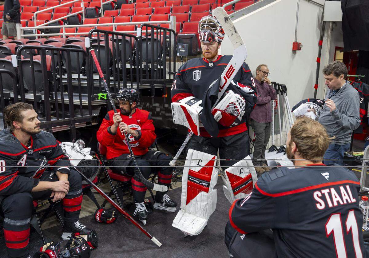 Carolina Hurricanes goalie Frederik Andersen (31) along with teammates Sebastian Aho (20), Seth Jarvis (24) and Jordan Staal (11) wait their turn for a video shoot following their practice on Monday, June 1, 2026 at Lenovo Center in Raleigh, N.C.  