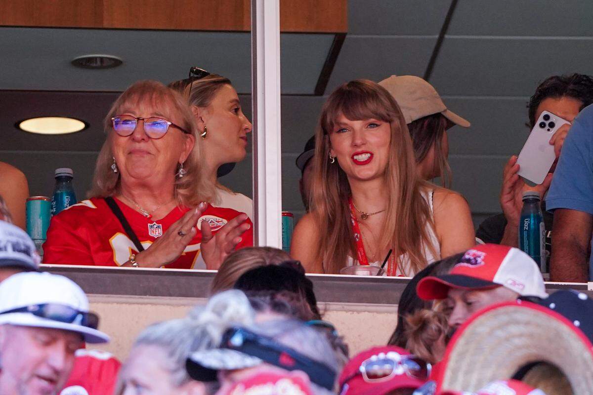Singer Taylor Swift, right, sits with Donna Kelce watching the Kansas City Chiefs vs Chicago Bears game in Kansas City, Missouri, on Sept. 24.