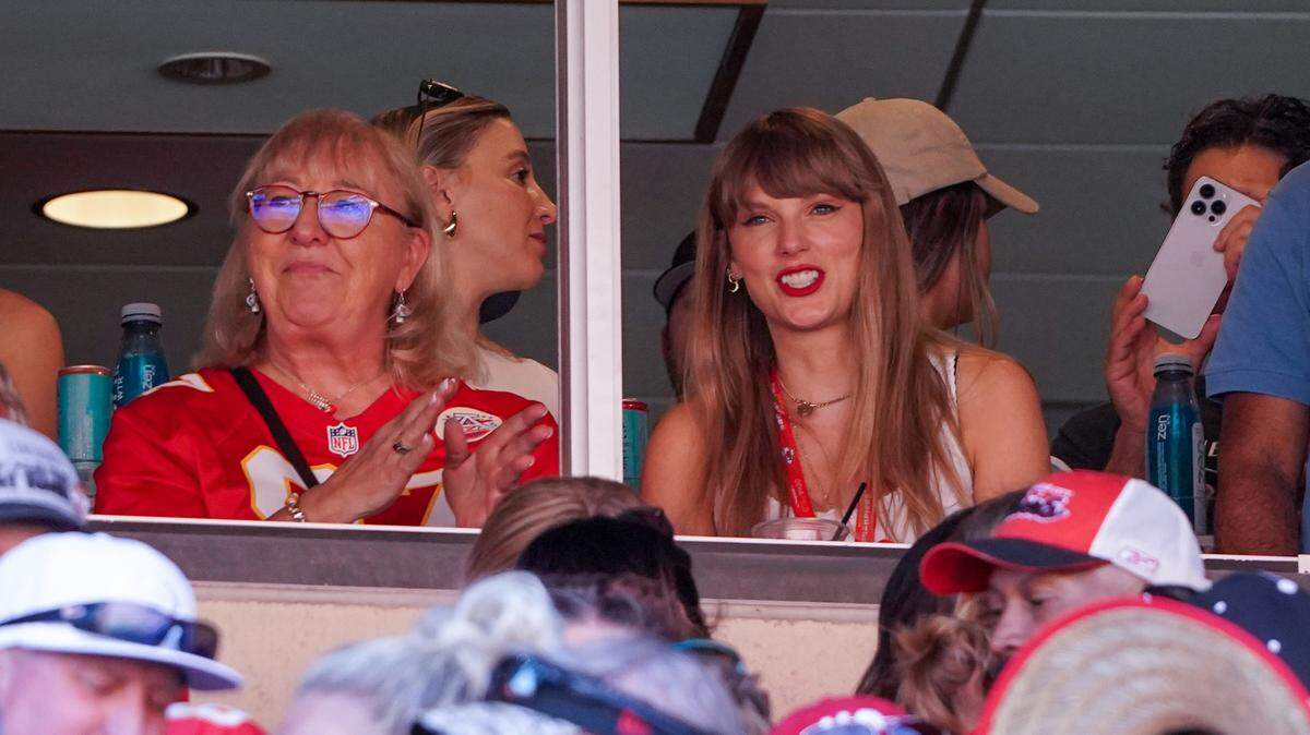 Singer Taylor Swift, right, sits with Donna Kelce watching the Kansas City Chiefs vs Chicago Bears game in Kansas City, Missouri, on Sept. 24.