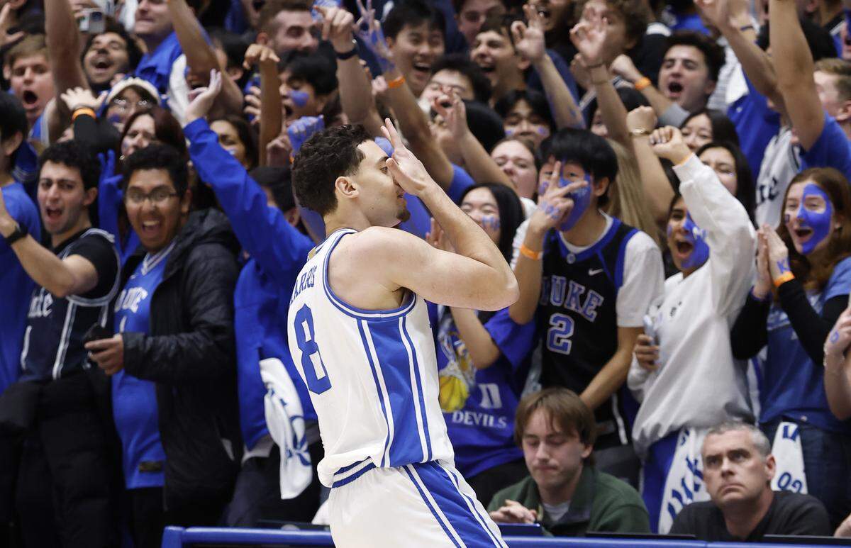 Duke’s Darren Harris (8) celebrates making a three-pointer during the first half of Duke’s game against Virginia at Cameron Indoor Stadium in Durham, N.C., Saturday, Feb. 28, 2026.