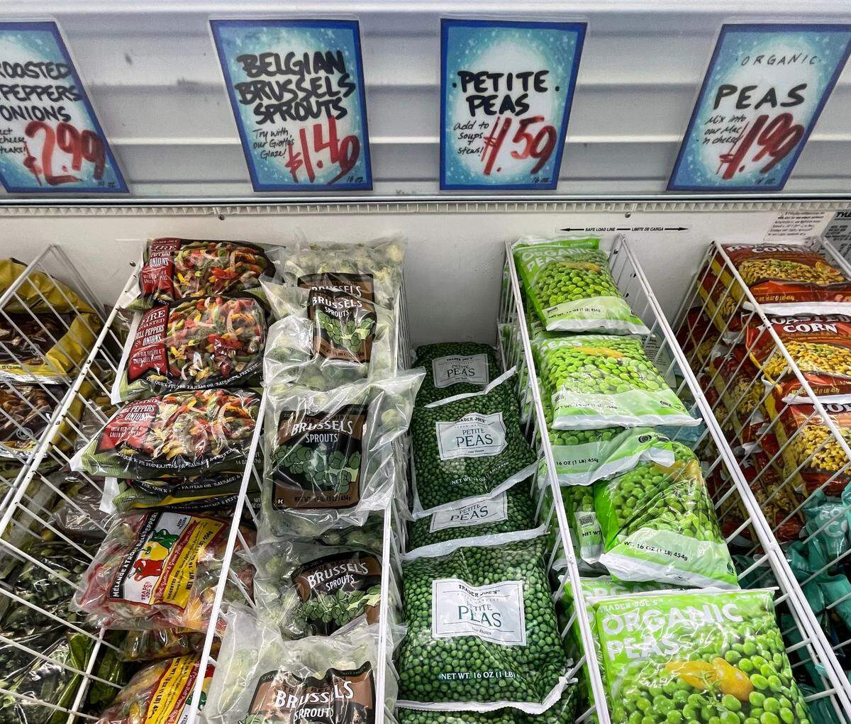 Frozen vegetables sit in a freezer at Trader Joe’s grocery store in Raleigh on June 27.