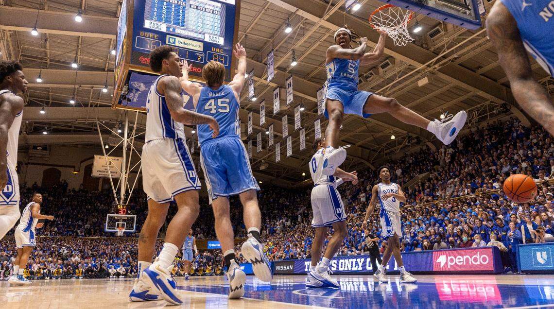 North Carolinas Armando Bacot dunks to give the Tar Heels a commanding 86-76 lead over Duke with :56 seconds to play on Saturday, March 5, 2022 in Durham, N.C. Bacot lead the Tar Heels with 23 points.