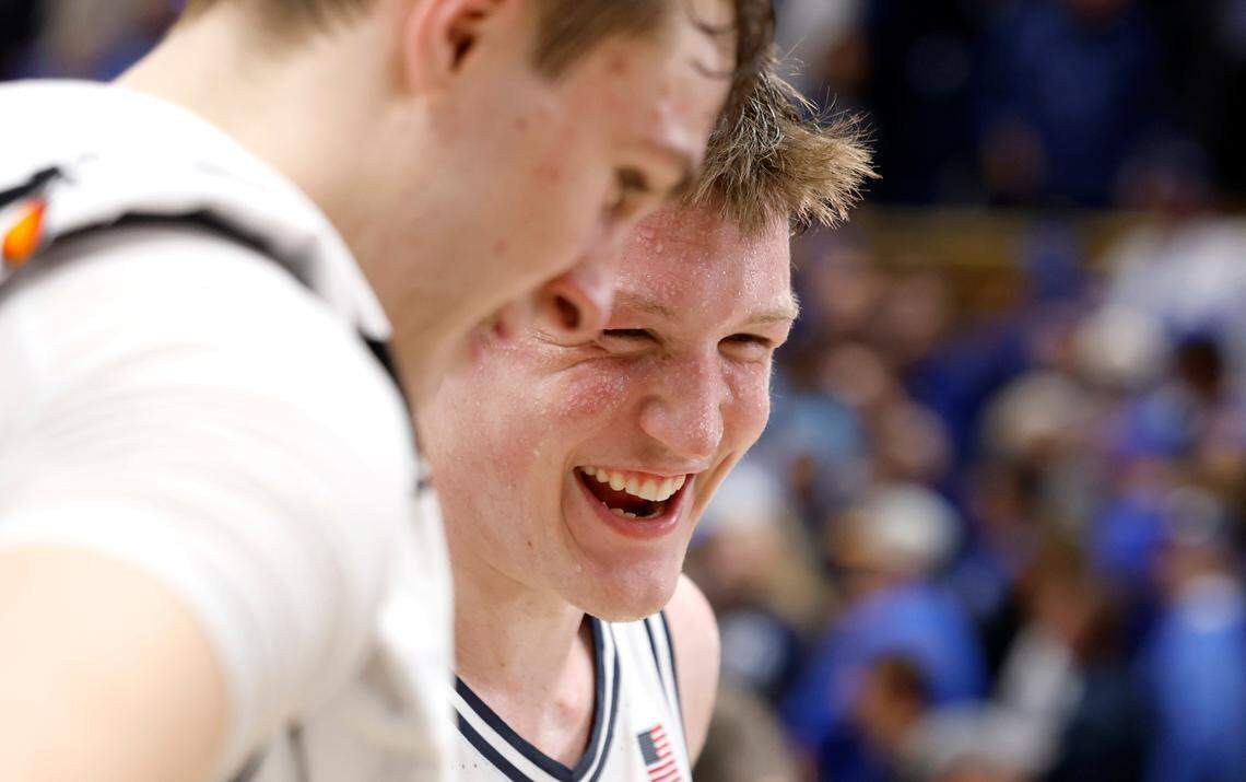 Duke’s Cooper Flagg (2) and Kon Knueppel (7) laugh while talking to ESPN after Duke’s 87-70 victory over UNC at Cameron Indoor Stadium in Durham, N.C., Saturday, Feb. 1, 2025.